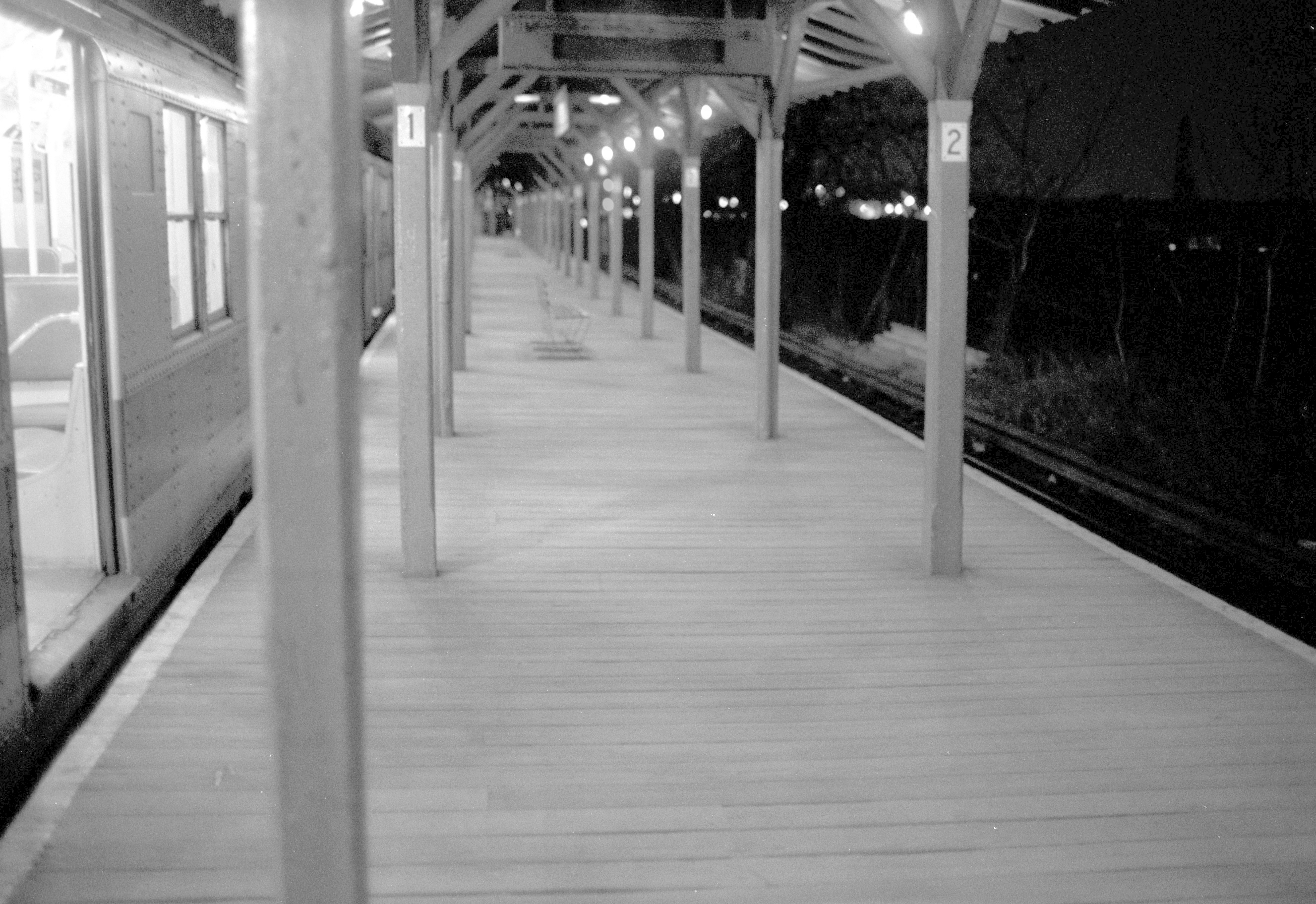 Now covered in cement, the platform between the tracks at the Metropolitan Avenue station in Middle Village were originally lined with wooden planks, similar to a beach boardwalk.